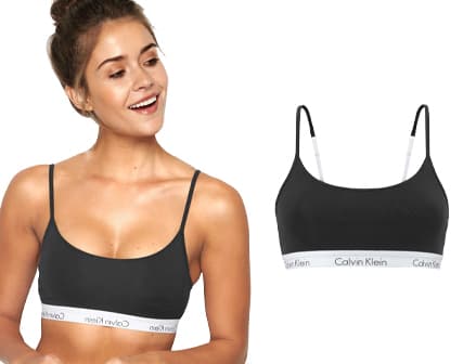 Vrouw met een zwarte bustier bh