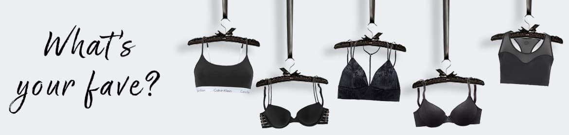 Verschillende bh's hangend aan klerenhangers