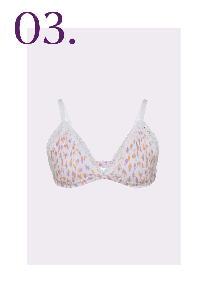Witte bralette met oranje en zwarte figuurtjes